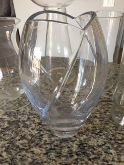 Heavy crystal vase and four glass vases