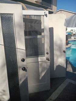 DOORS, SOLID WOOD, EXTERIOR/INTERIOR, MULTIPLE SIZES, BUILT IN SLIDING WINDOWS W/SCREENS & BLINDS, HARDWARE, GOOD CONDITION!