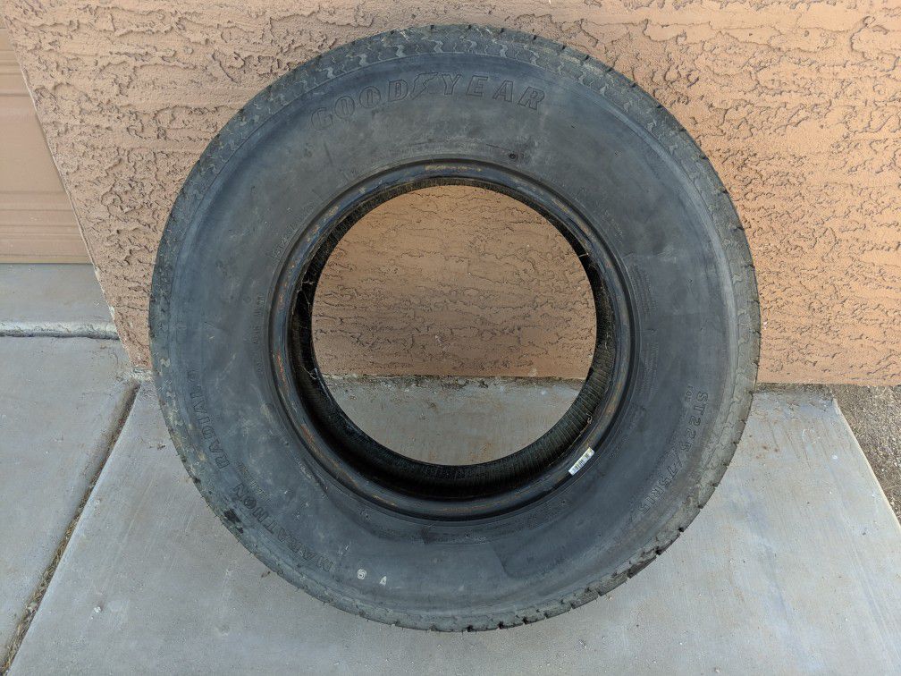 Good spare tire- 225-75R15 trade , cash or Barter