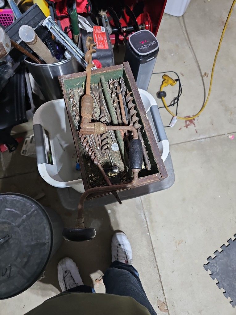 Old Hand Drill With Lots Of Bits