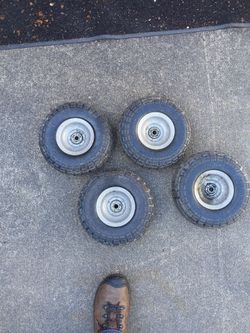 Four flat free wheels 4.10/3.50 new , $35 never used