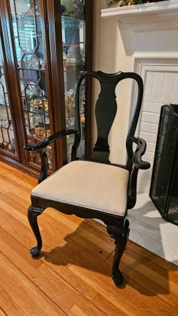 A traditional Queen Anne style dining armchairs