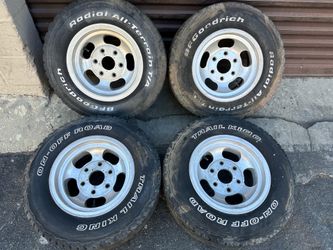 Four 6 lug c10 slotted mags, Chevy gmc Nissan Datsun 14x7