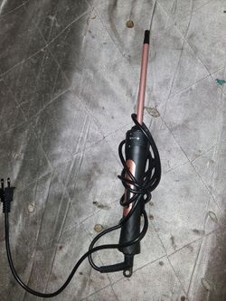Hair Curling Iron , with a couple extra extinctions