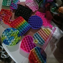 14 RUBBER PUSH POP TOY 12 ALL FINAL PRICE