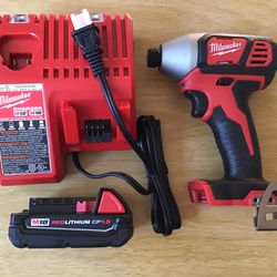 Milwaukee M18 Impact Driver With Charger And Battery. Brand NEW.