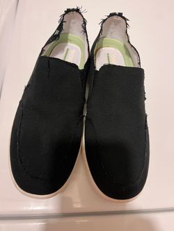 Minnetonka slip-on shoes
