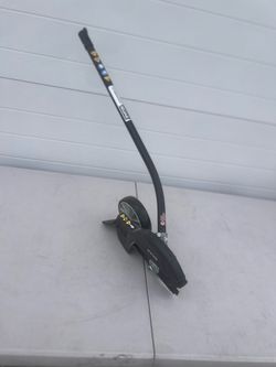 Ryobi Expand-It 8 in. Universal Straight Shaft Edger Attachment RYEDG12. New open box without retail packaging. Item does have scratches and scuff mar