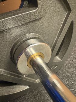 Brand New Olympic Weightlifting Equipment; Curl Bar with Pair of 25s and Pair of 10s. 90 # Brute.