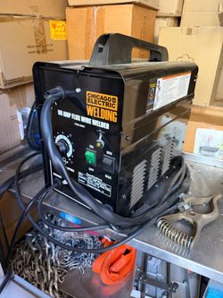 Chicago Electric 90 Amp Flux Wire Welder and welding helmet