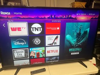 LG Flat Screen TV with Roku 50”