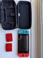 NINTENDO Switch Console + Travel Case + Animal Crossings Game
