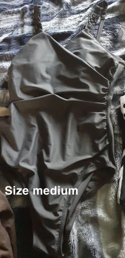 Grey one medium. Dots is large