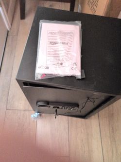 Brand new Amazon Basics steel home security safe.