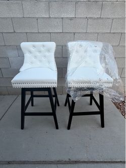 30 in. White Faux Leather Upholstered Solid Wood Frame Bar Height Swivel Bar Stool (Set of 2)