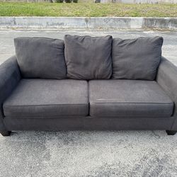 No, three person sofa, dark black