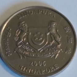 2006 Singapore Error 20 Cent Coin. Die Chip On Ribbon