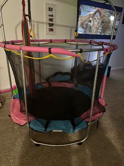 Pink and blue indoor/outdoor trampoline