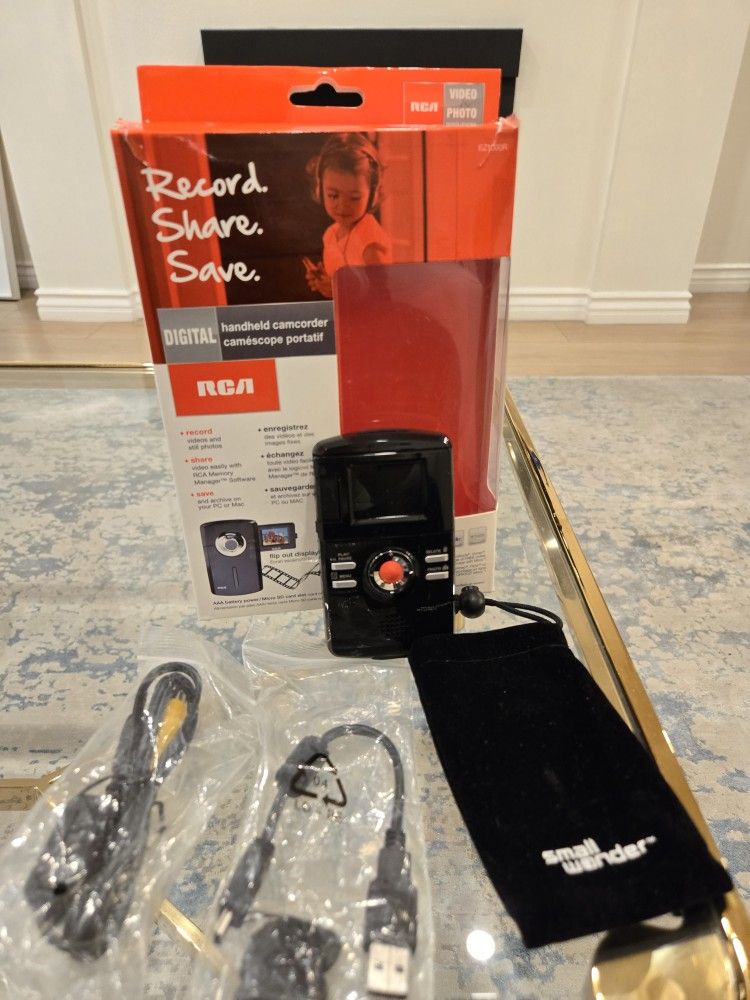 Brand New RCA Digital Handheld camera and Camcorder. High Quality Record Share With Flip out display