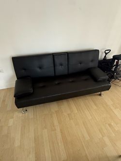 Se vende sofá cama de cuero casi nuevo