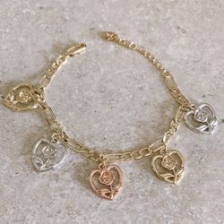 Gold plated bracelet with heart pendants