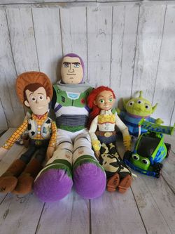 Vintage toy story toys, sleeping bag and blanket