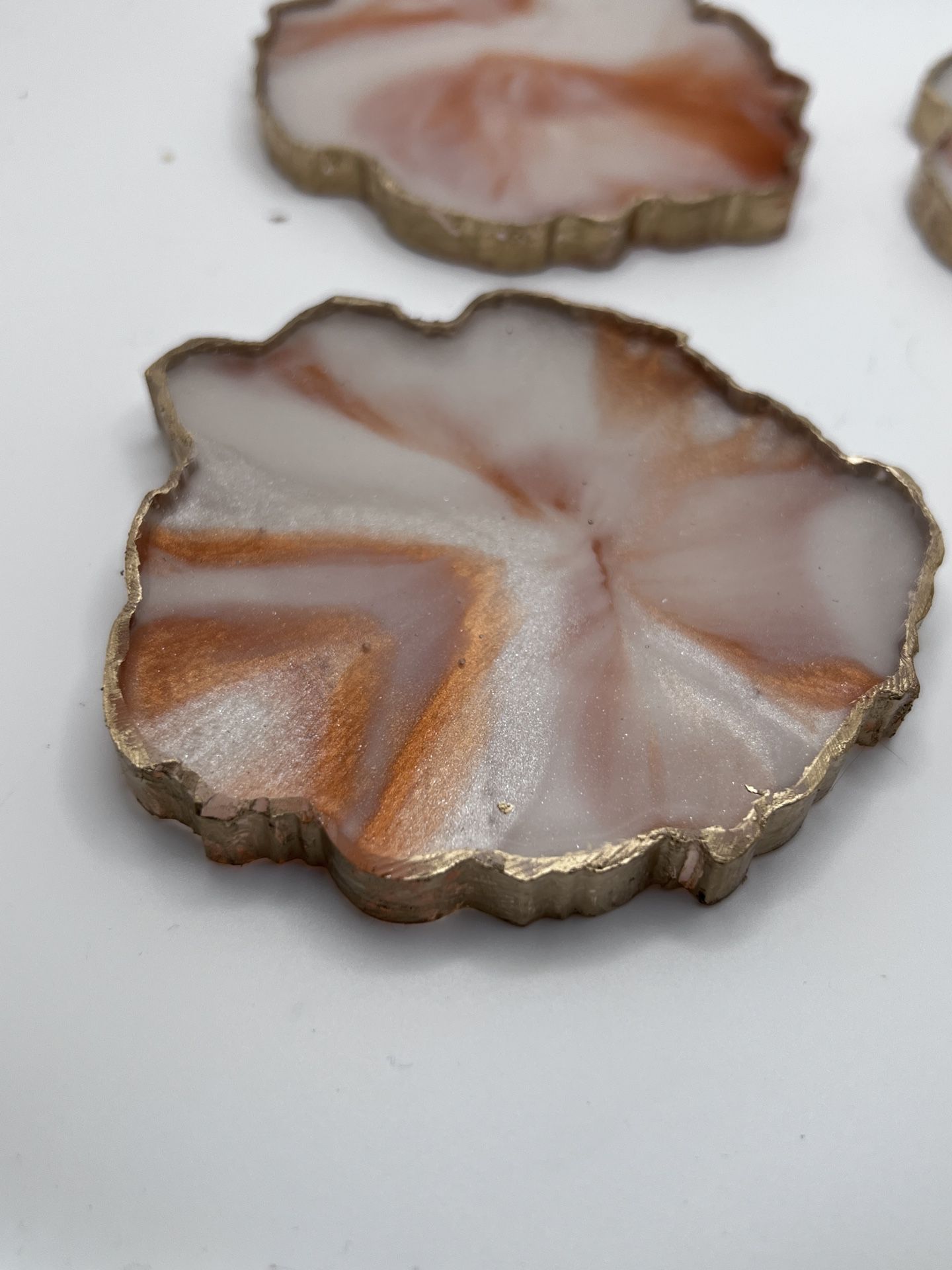 Set Of Four Copper And White Handmade Resin Coasters