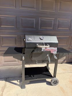 NEW ASSAMBLED FROM THE BOX CHARCOAL GRILL