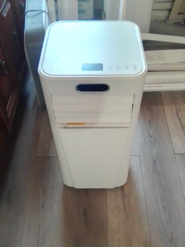 Portable Air Conditioner/ Dehumidifier / Heater