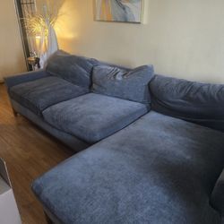 Living Spaces: Comfy Light Blue Couch