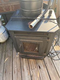 Pellet stove,pellets,and vacuum