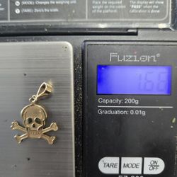 14kt GOLD SKULL PENDANT 