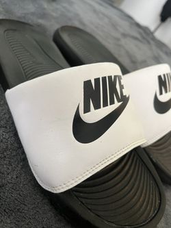 2 pairs size 9.5 Mens Nike slides 