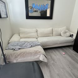 L shaped cream colored couch