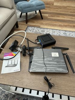 Arris SURFboard Cable Modem And NETGEAR Nighthawk X4 Ultimate Gaming router