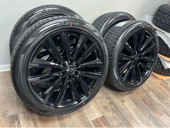 NEW 24 inch gloss black Gm style wheels wrapped in atturo 285/40r24 tires