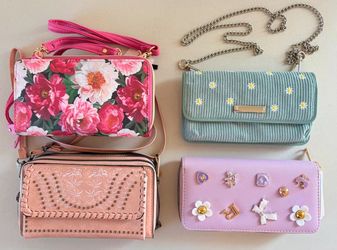 * Four brand new clutch purse wallets. $20 takes all of them!
