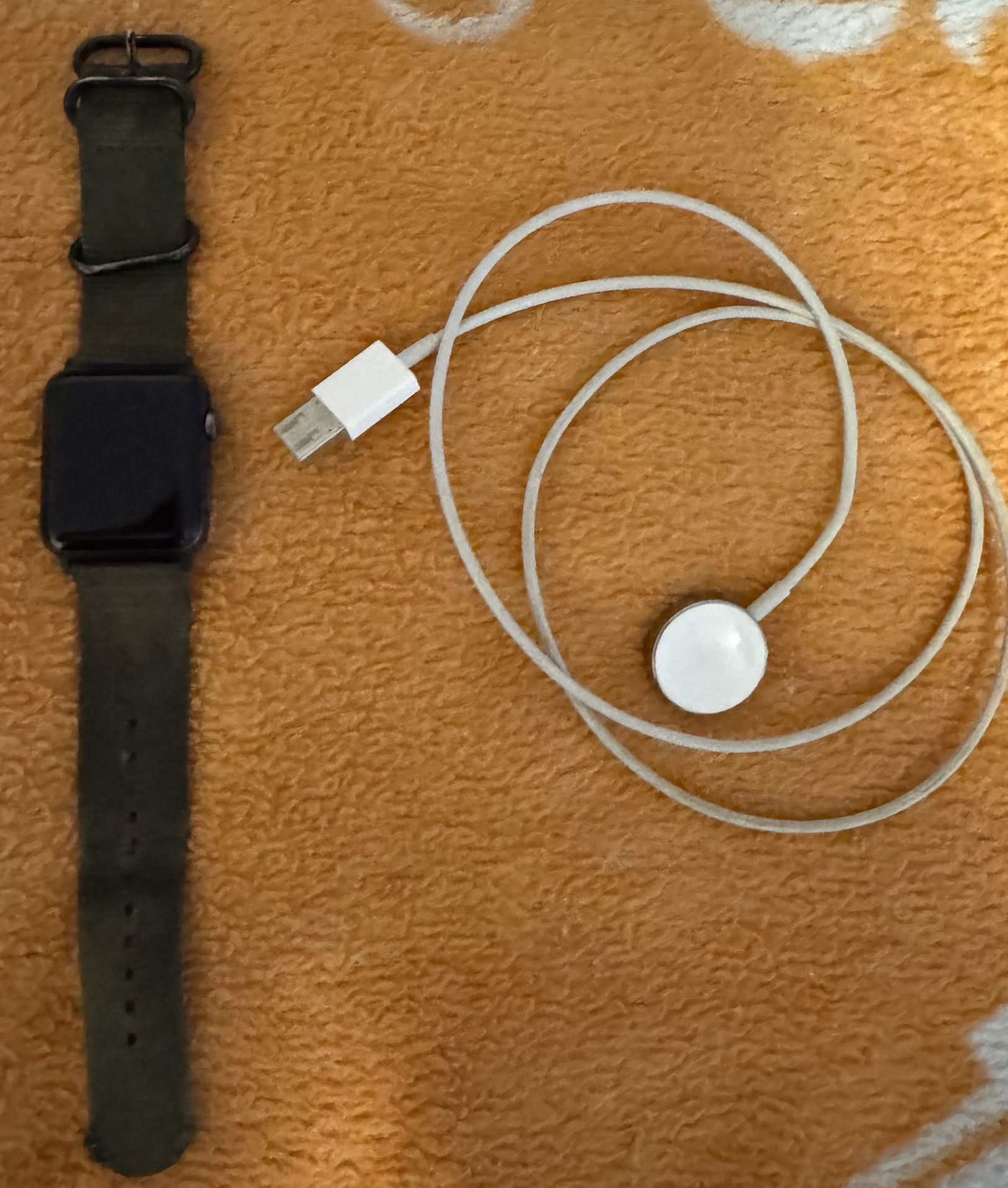 Apple Watch Series 3 with charger