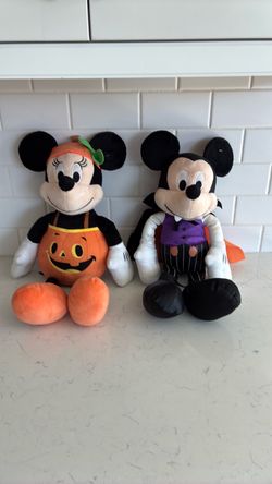 Two Halloween Mickey Mouse dolls