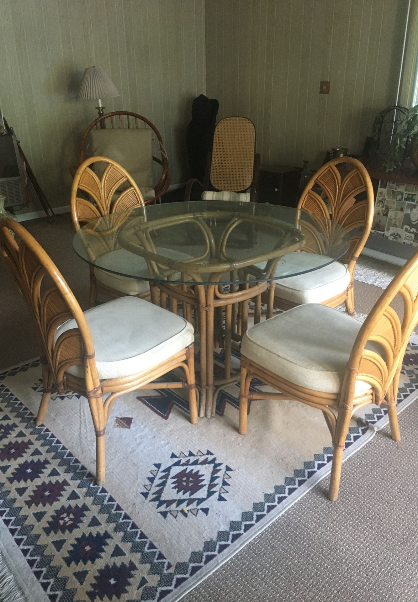 Glass table with four chairs