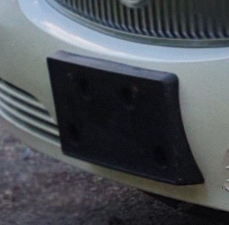 Vanity Plate Bracket off a 2009 Buick Lucerne.