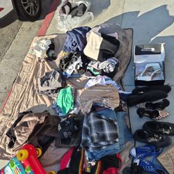 Assorted brand new and slightly used clothes and shoes