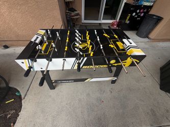 Kids soccer table asking $50 size 4 ft long x 2 ft wide x 31” top
