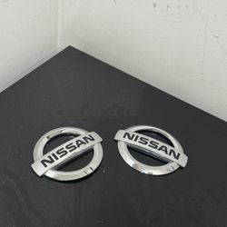 2 pieces Nissan emblems