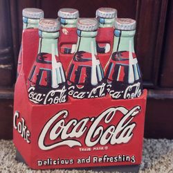 1997 Coca-Cola Company cast iron door stopper