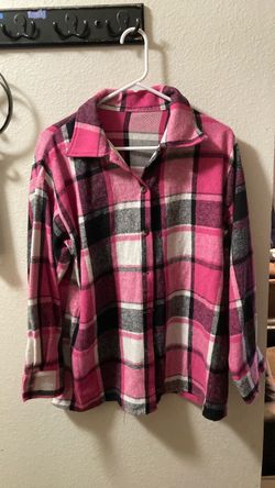 Women’s pink and black plaid long sleeve shirt
