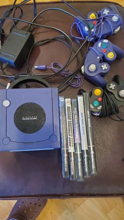 Gamecube with 3 controllers, 2 memory sticks and 5 games