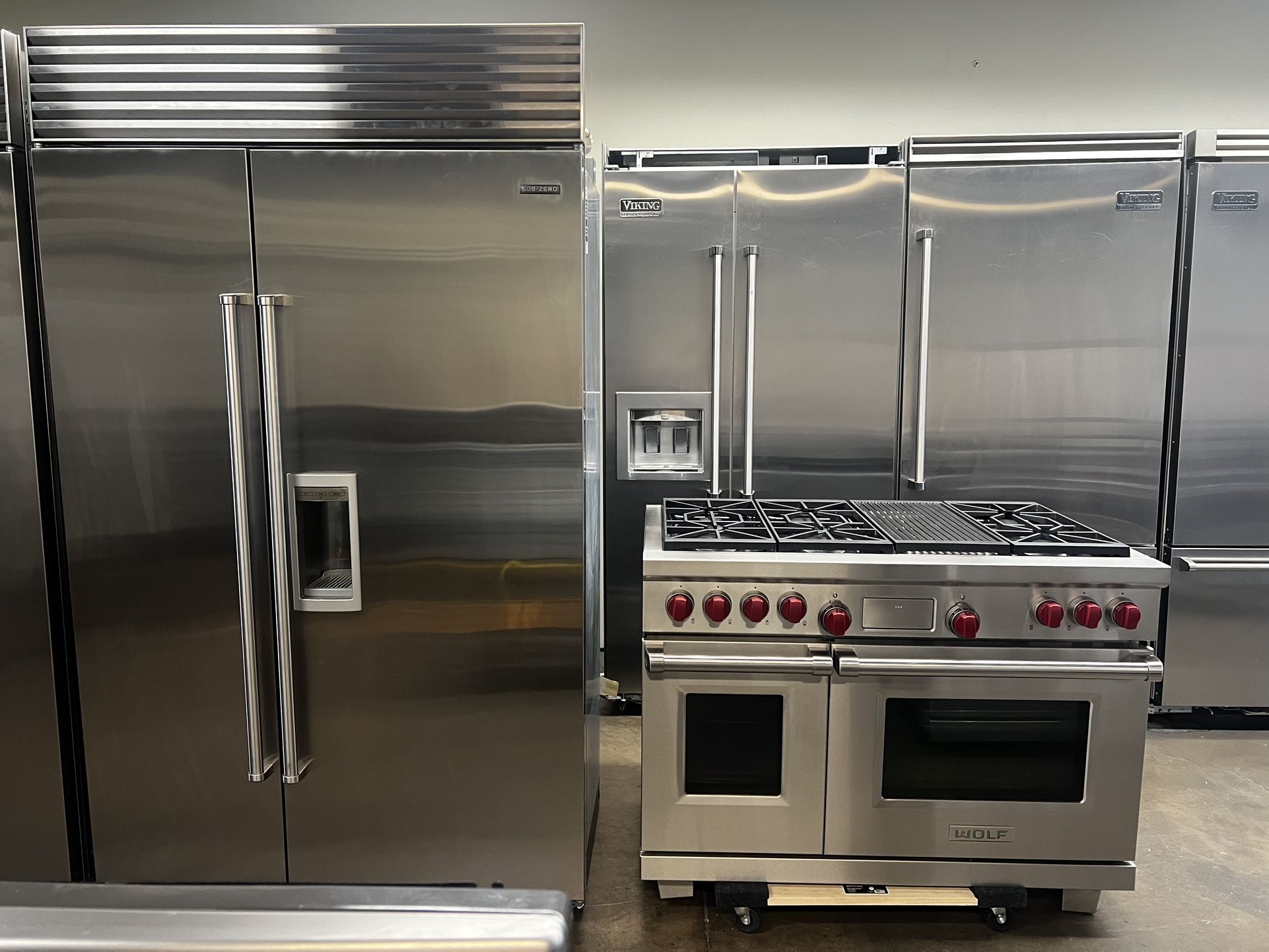 Sub Zero 48”Wide Built In Refrigerator And Wolf 48”Wide Dual Fuel Range Stove