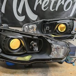 Brand New OEM Evo Headlights