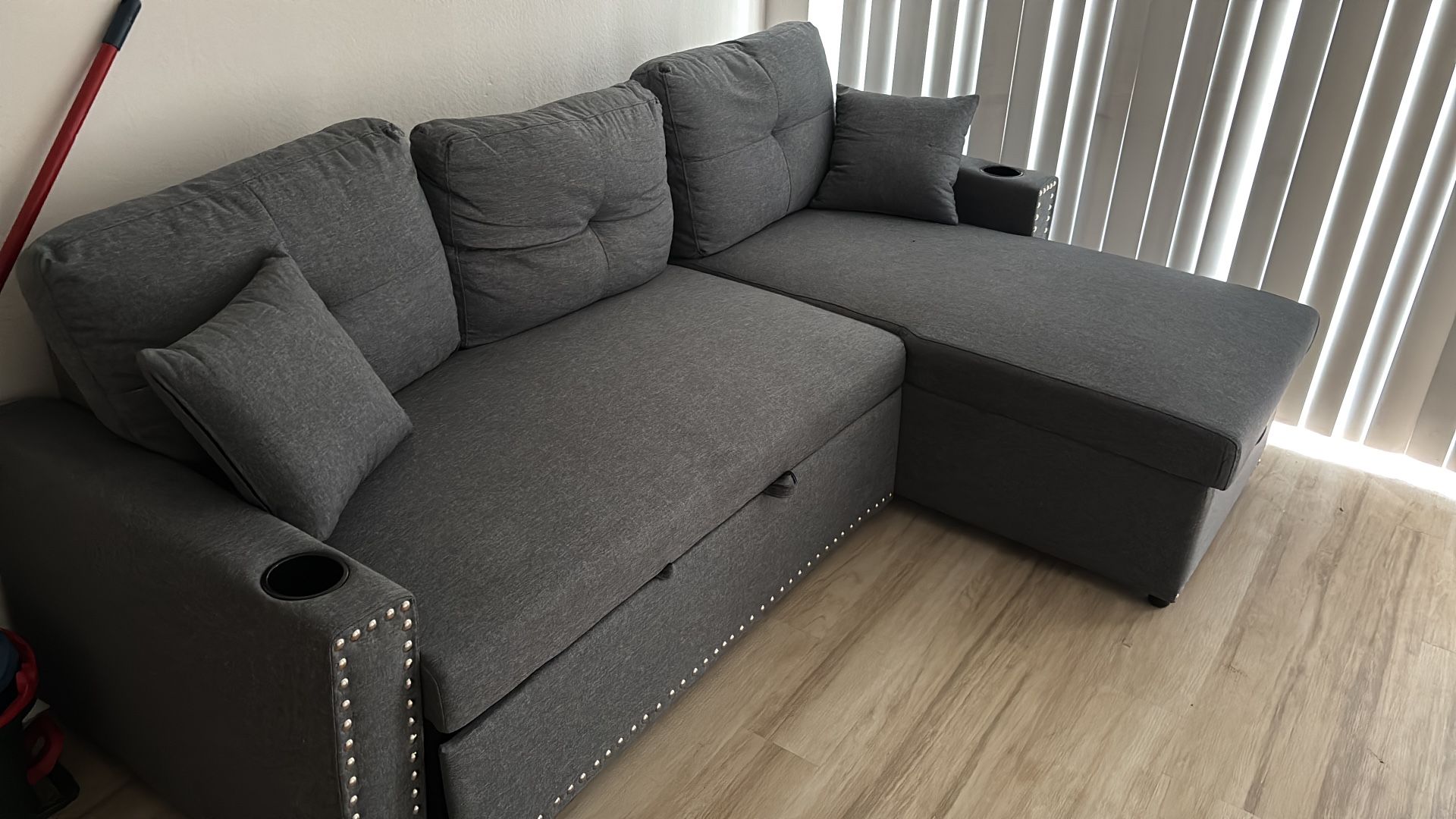 Moving -Like New, Grey Sectional Sofa Pullout Bed Gray Studded Couch